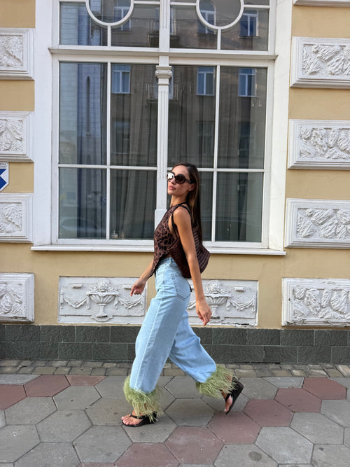Джинси із зеленим пір'ям
